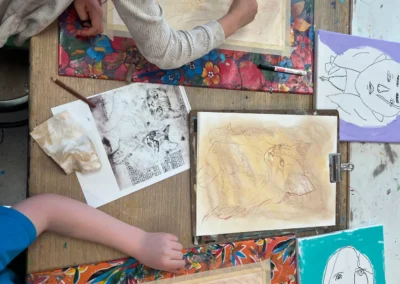 students painting and drawing