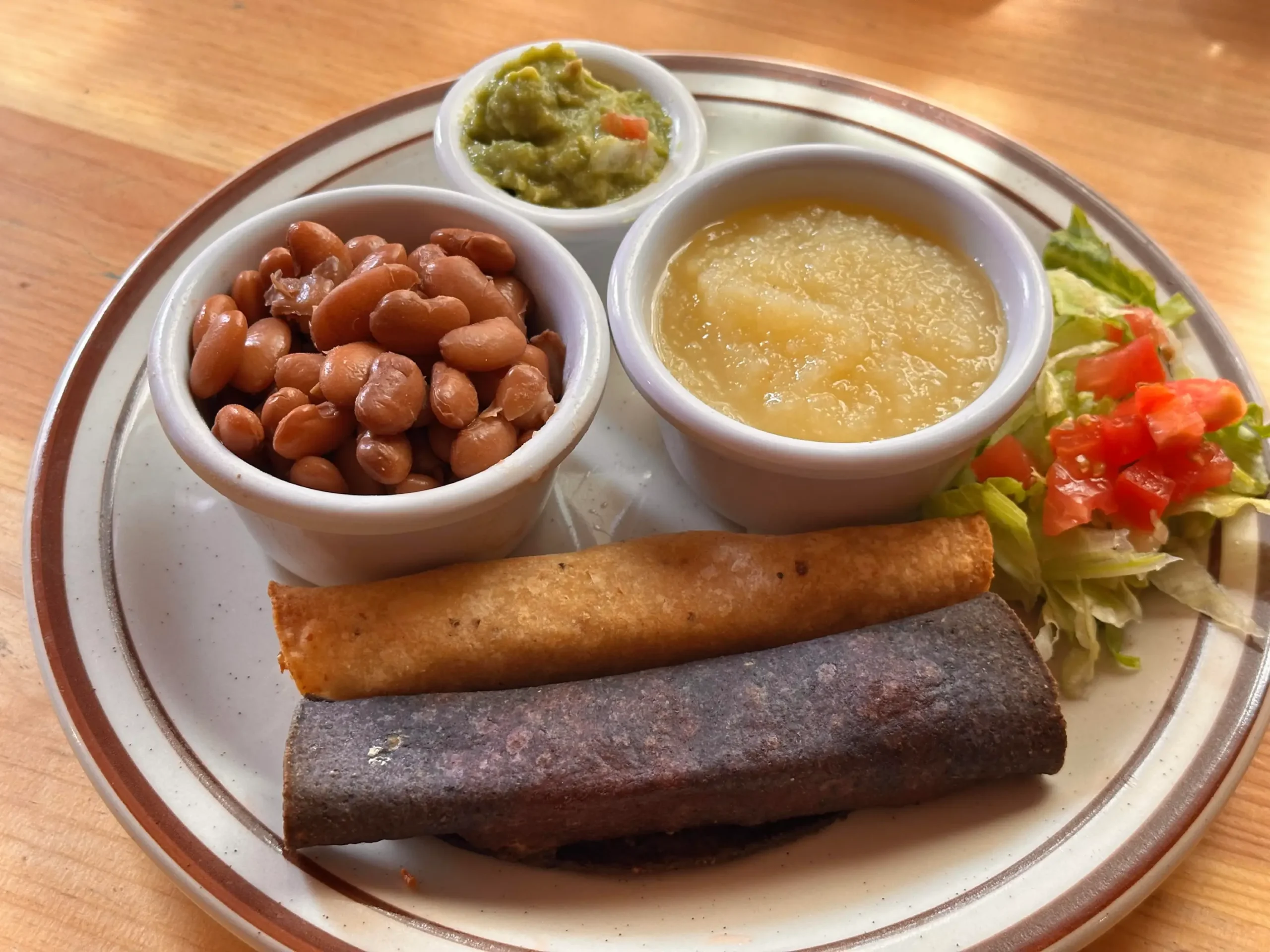 Taquitos kids meal with beans applesauce and guacamole
